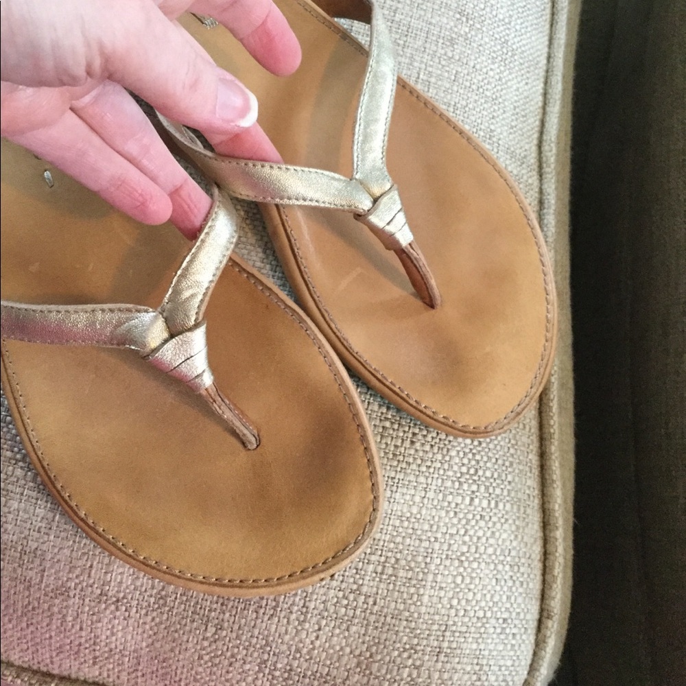 OluKai leather gold flip flop sandals